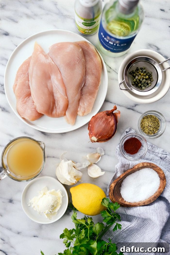 Bright & Healthy Chicken Piccata 3 Skillet with cooked Lighter Chicken Piccata