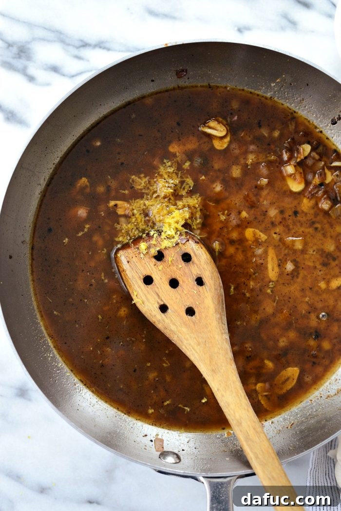 Bright & Healthy Chicken Piccata 10 Adding chicken broth to the piccata sauce