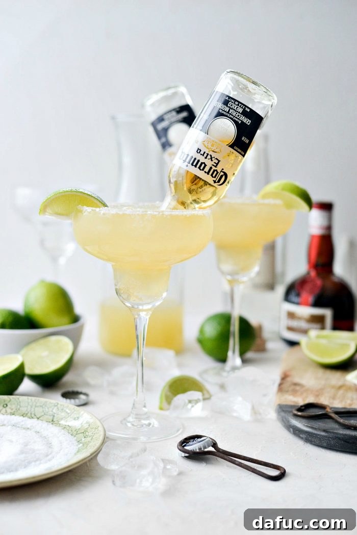 Signature Beergarita 12 A Beergarita glass with ice and margarita mix, ready for the inverted beer bottle.