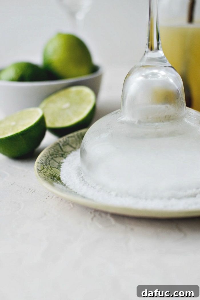 Signature Beergarita 9 A margarita glass with its rim perfectly coated in coarse margarita salt.