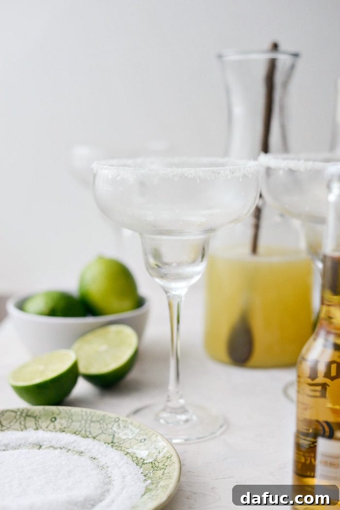 Signature Beergarita 10 Multiple margarita glasses prepared with salted rims.