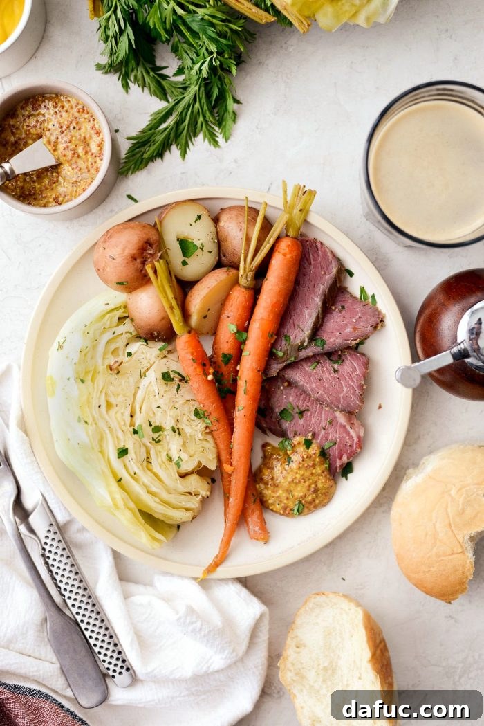 Effortless Slow Cooker Corned Beef and Cabbage 17 Final presentation of Slow Cooker Corned Beef and Cabbage with fresh parsley garnish