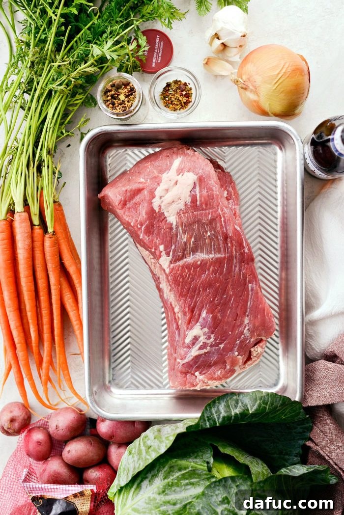Effortless Slow Cooker Corned Beef and Cabbage 4 Close up of corned beef brisket and vegetables in a slow cooker