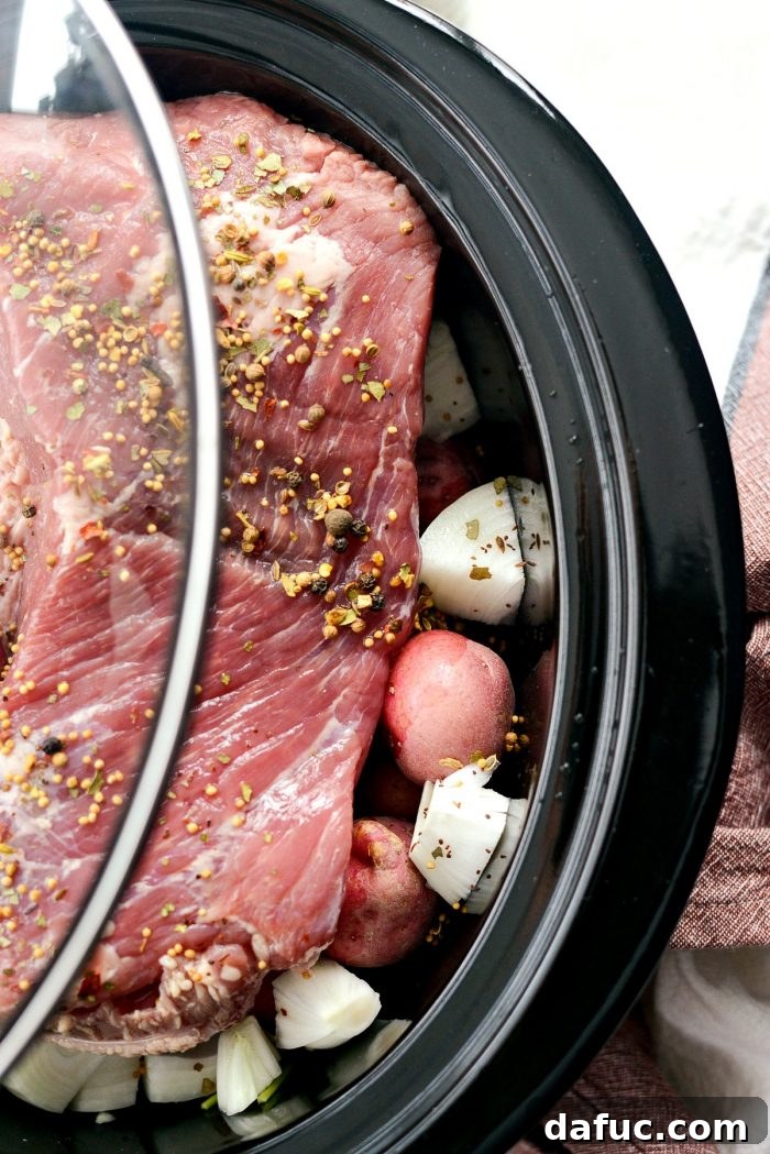 Effortless Slow Cooker Corned Beef and Cabbage 9 Slow cooker lid secured, cooking corned beef and cabbage