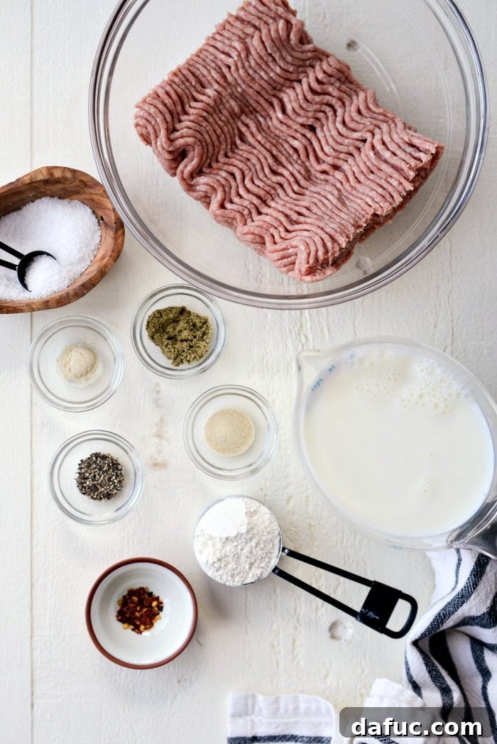 Close-up of Homemade Turkey Sausage Breakfast Gravy in a skillet, showcasing its thick, creamy texture and savory ground turkey.