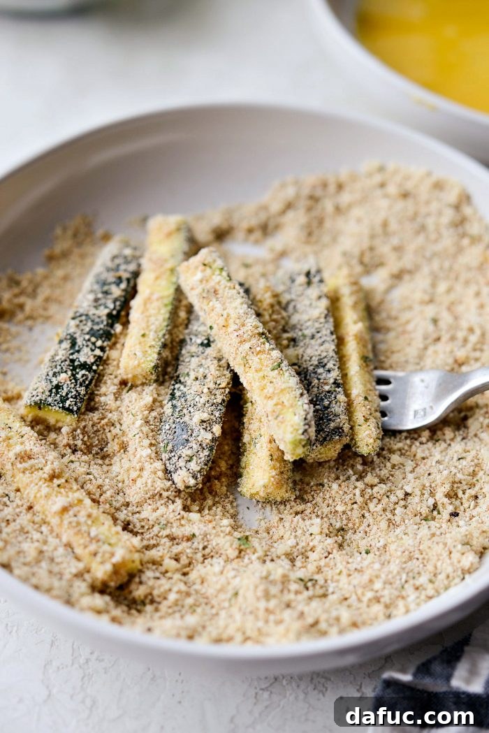 Crispy Air-Fried Zucchini Sticks 15 Close-up of perfectly coated zucchini fries, showcasing the textured breading.