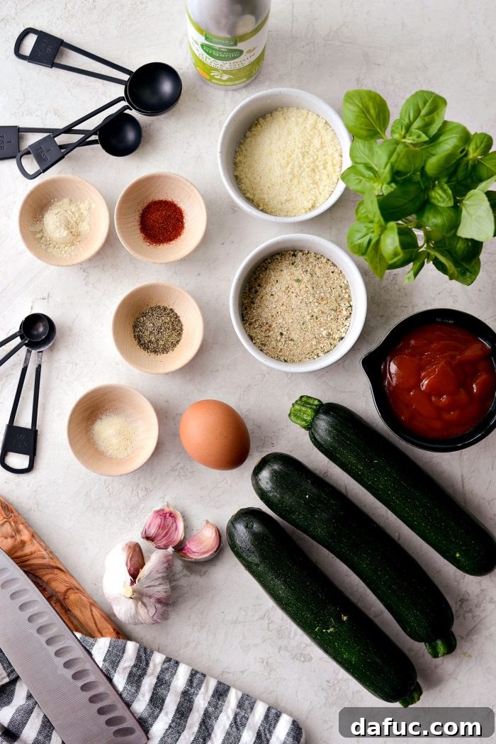 Crispy Air-Fried Zucchini Sticks 3 Top-down photo of ingredients for air fryer zucchini fries and basil ketchup.