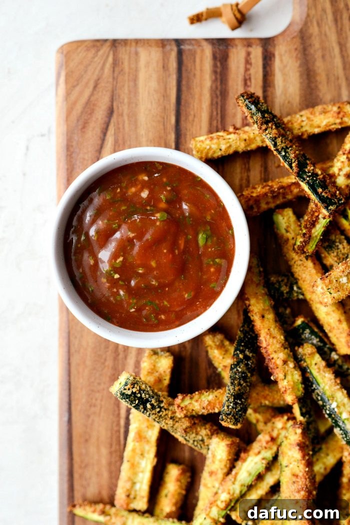 Crispy Air-Fried Zucchini Sticks 22 Close-up of freshly made basil ketchup in a grey bowl, ready for serving.