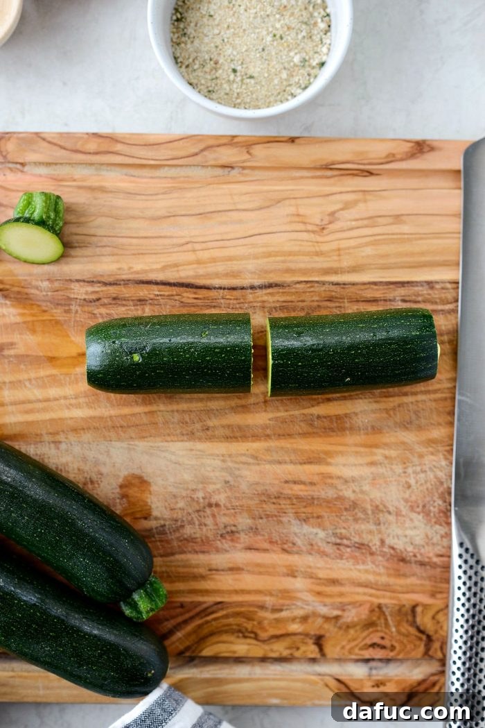 Crispy Air-Fried Zucchini Sticks 5 Trimmed zucchini cut in half lengthwise for easier slicing.