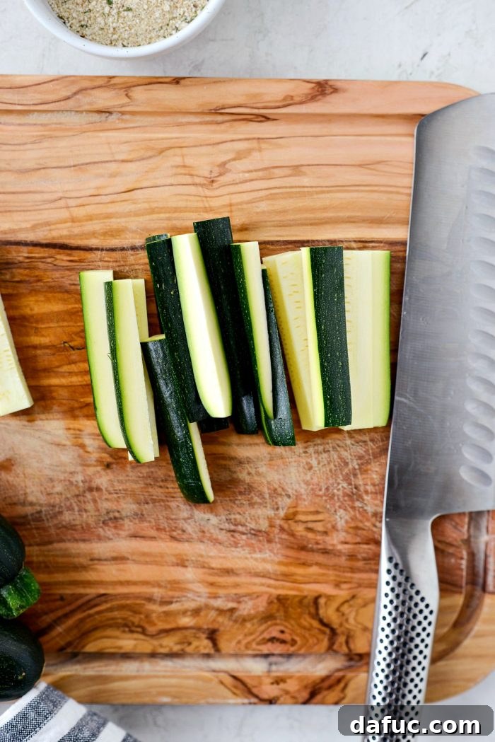 Crispy Air-Fried Zucchini Sticks 7 Zucchini planks expertly cut into 1/2-inch sticks, ready to be "fries".