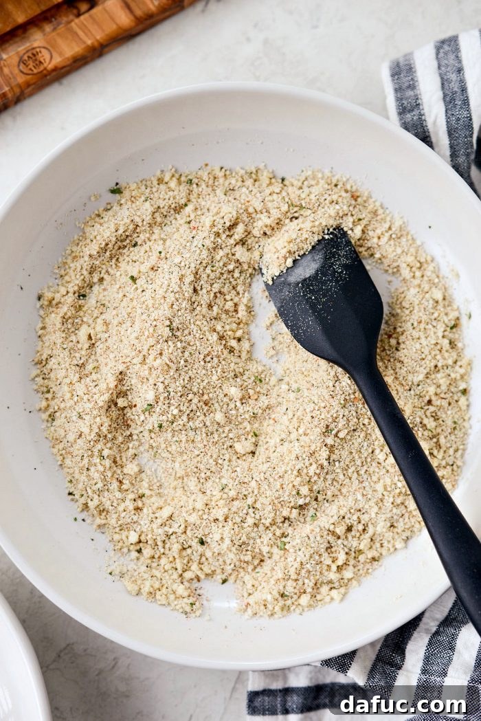 Crispy Air-Fried Zucchini Sticks 10 Close-up of the well-combined breadcrumb mixture in a shallow bowl.