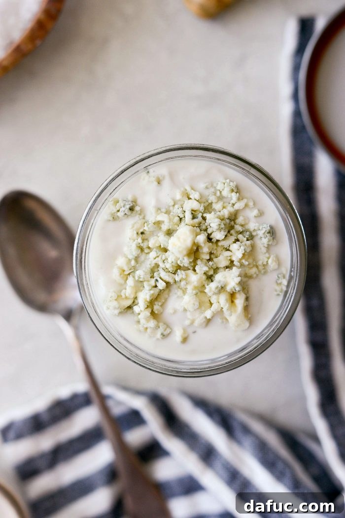 Tangy Greek Yogurt Blue Cheese Dressing 7 Close up shot of creamy Greek Yogurt Blue Cheese Dressing