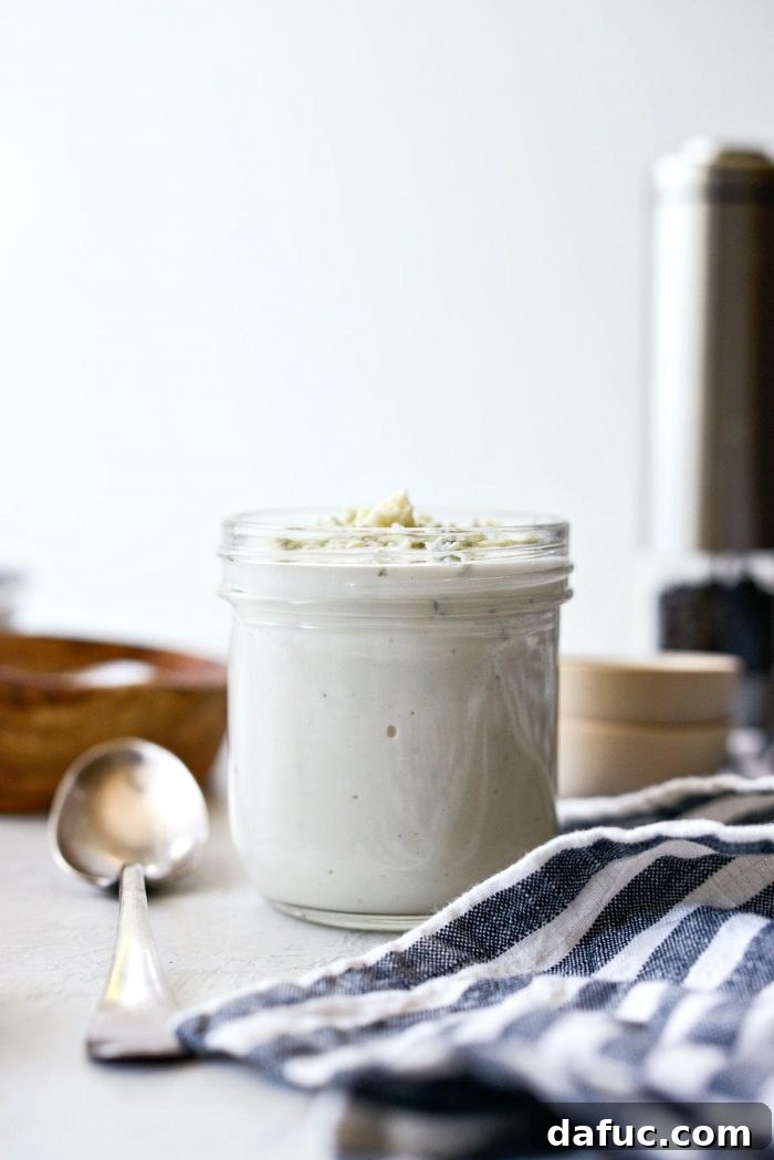 Tangy Greek Yogurt Blue Cheese Dressing 8 Greek Yogurt Blue Cheese Dressing stored in a glass jar in the refrigerator