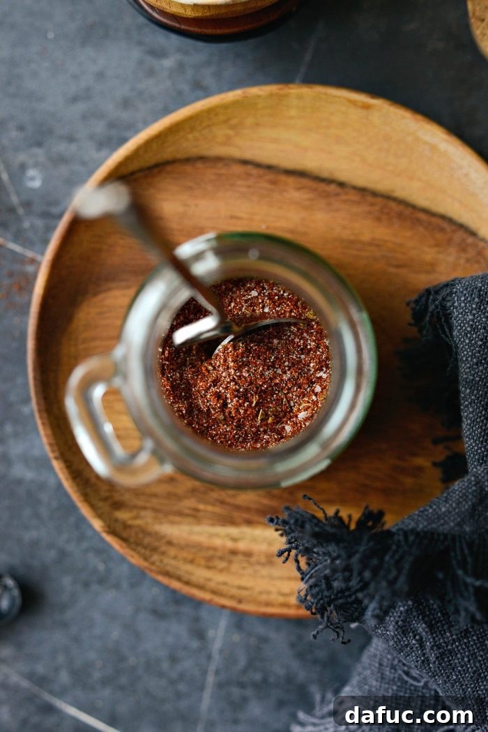 Smoky Chipotle Spice Mix 7 The fully mixed smoky chipotle seasoning blend, settled in a glass jar.