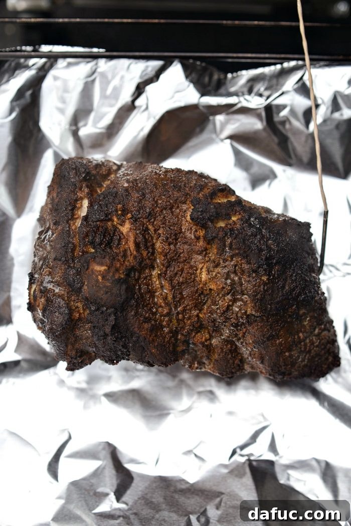 wrap the smoked pork shoulder in heavy duty foil.