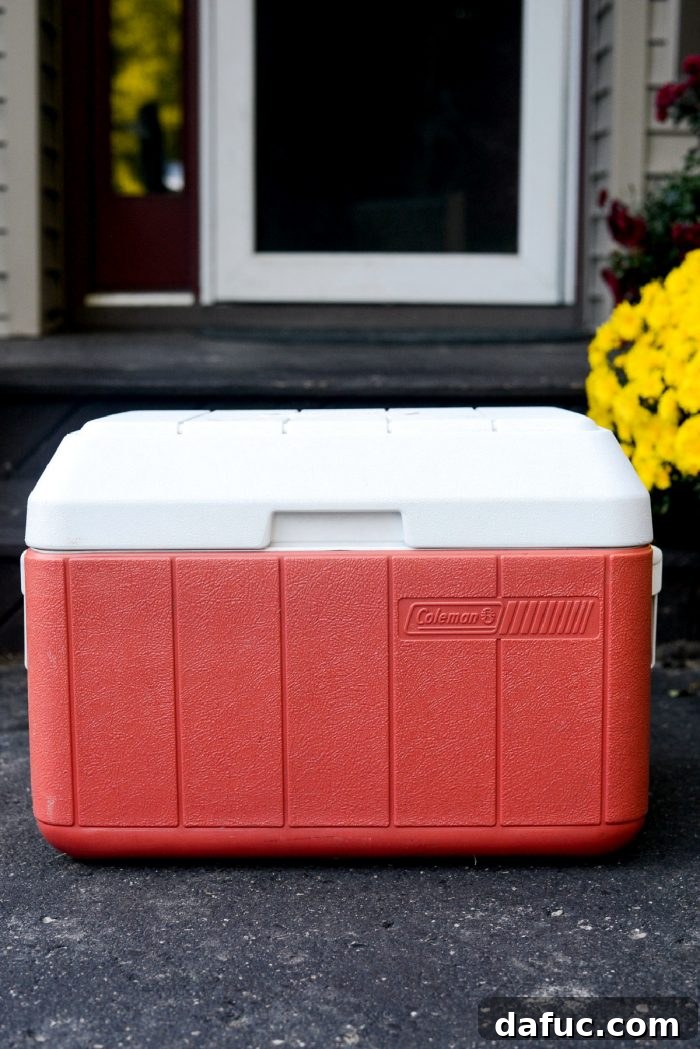tuck towels around wrapped pork shoulder in cooler to rest for 2 to 4 hours.