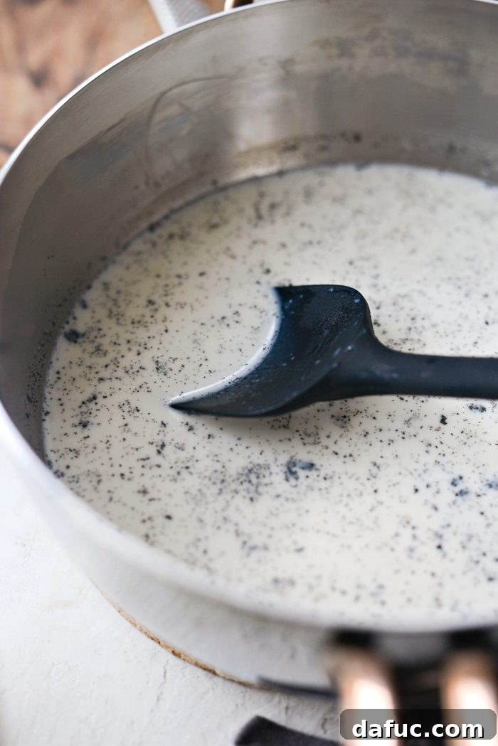 Velvet Vanilla Gelato 11 Stirring and heating the milk until hot, infused with vanilla.