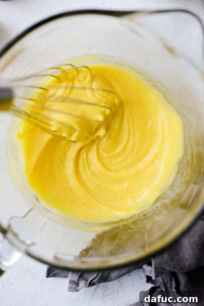Velvet Vanilla Gelato 6 Whisked egg yolks and sugar forming a pale yellow mixture.