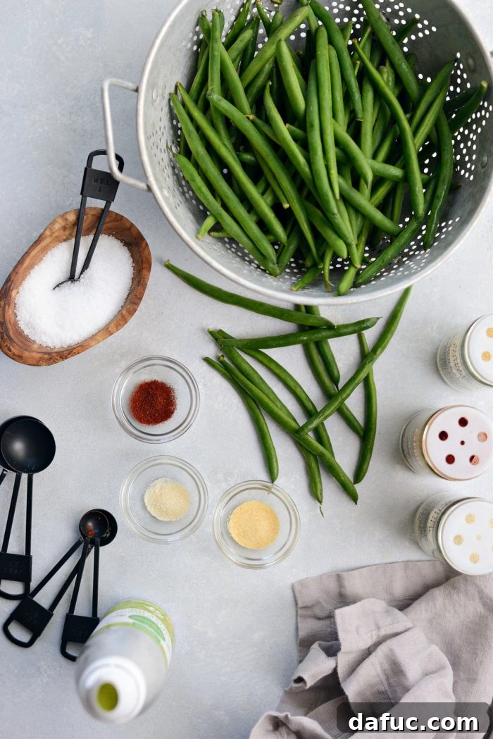 Crispy Air Fryer Green Beans 4 Air Fryer Green Bean Ingredients laid out on a kitchen counter