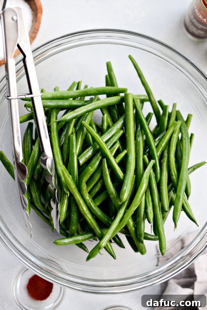 Crispy Air Fryer Green Beans 6 Green beans lightly sprayed with olive oil and tossed for even coating