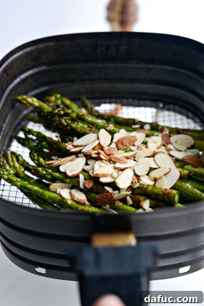 Crispy Air Fried Balsamic Asparagus 10 Almonds and balsamic asparagus in air fryer basket