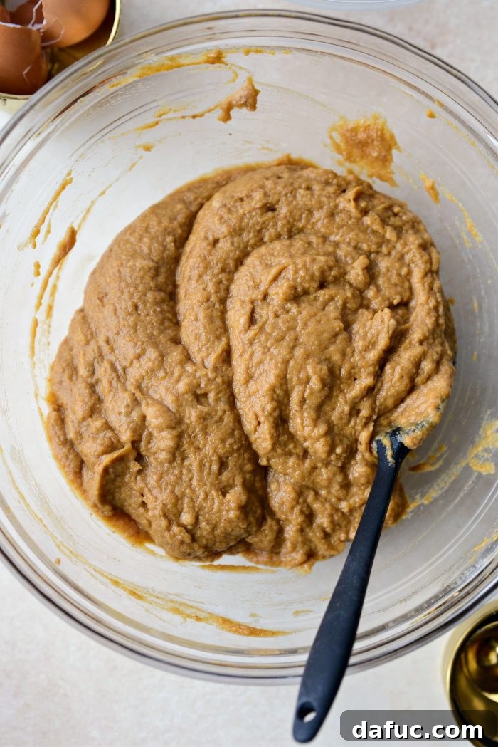 Smooth and creamy pumpkin pie batter in a bowl