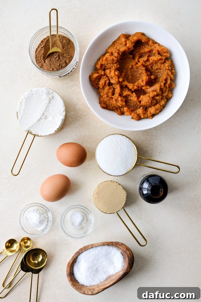 Ingredients for Mini Crustless Pumpkin Pies laid out on a table