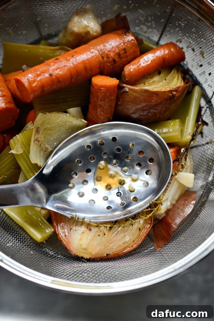 Delicious Gravy, Made in Advance 14 press vegetables to squeeze out any liquids - Pressing vegetables in the sieve