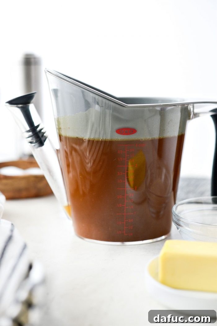 Delicious Gravy, Made in Advance 16 turkey broth in fat separator - Broth in a fat separator