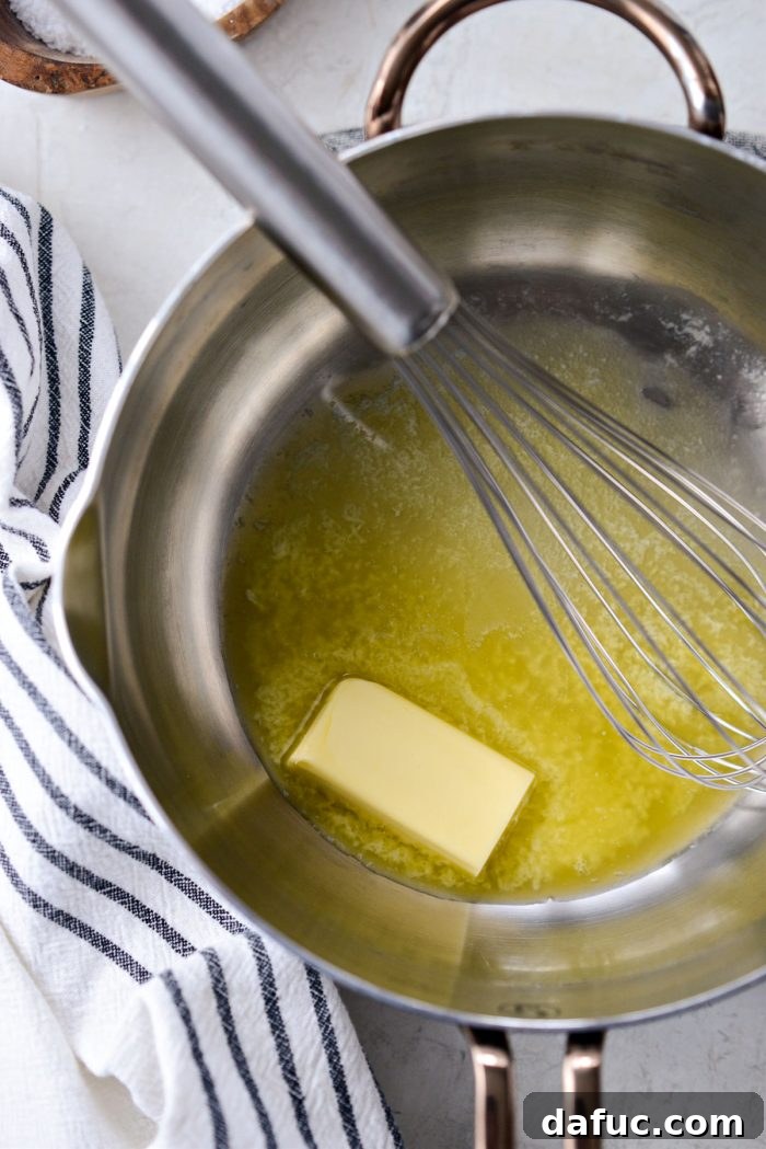 Delicious Gravy, Made in Advance 17 melting butter in a saucepan - Melted butter in a saucepan