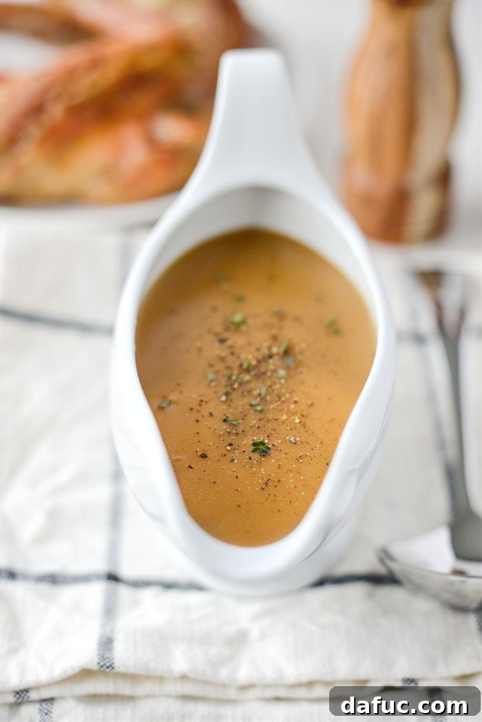 Delicious Gravy, Made in Advance 23 Make Ahead Turkey Gravy stored in a container