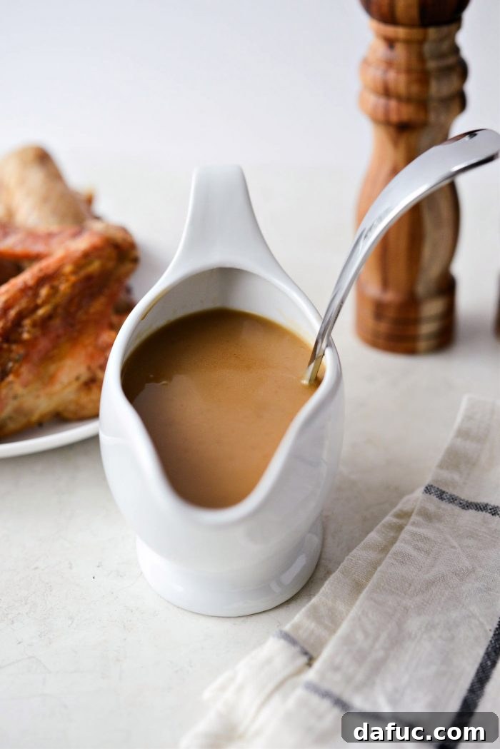 Delicious Gravy, Made in Advance 26 Make Ahead Turkey Gravy poured over mashed potatoes