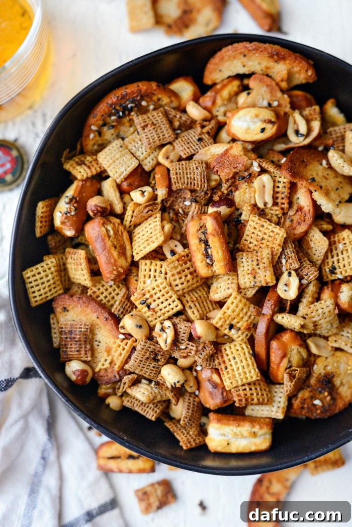 The Ultimate Everything Bagel Chex Mix 14 Final close-up shot of the Everything Plus the Bagel Chex Mix, showing off the perfectly toasted, seasoned ingredients ready to be devoured.