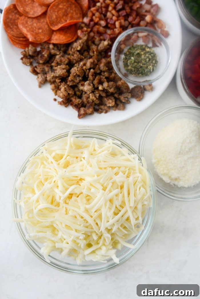Ultimate Focaccia Pizza 15 Bowls of grated fontina, mozzarella, and Parmesan cheeses.