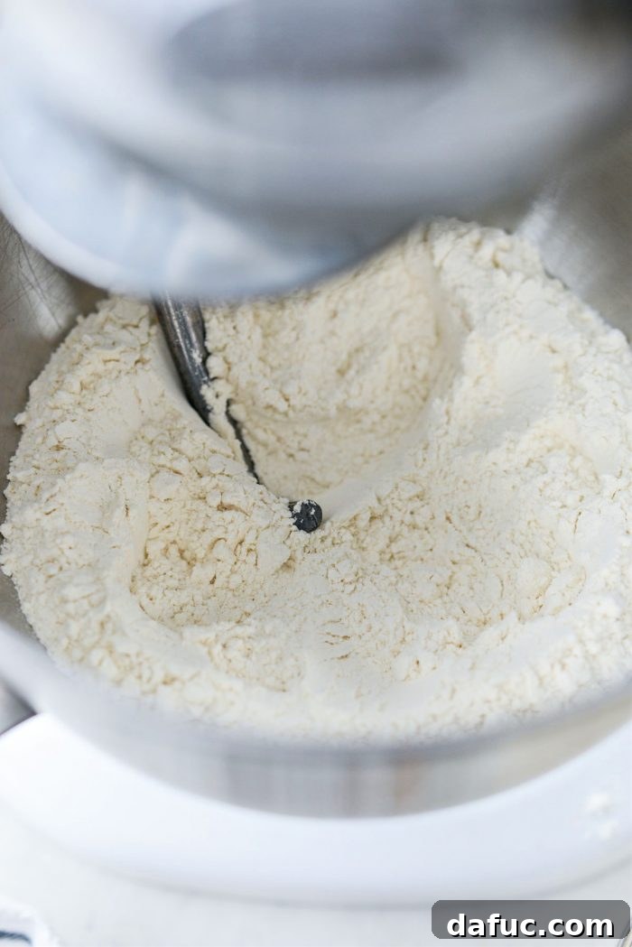 Ultimate Focaccia Pizza 7 Bread flour and kosher salt in the stand mixer bowl.