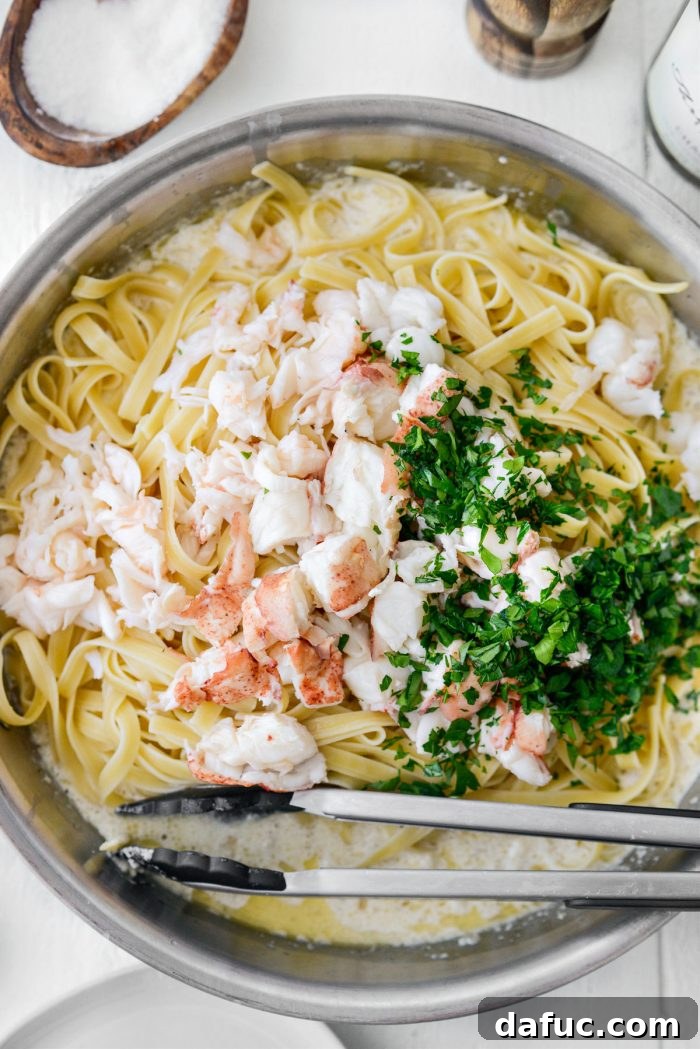 add cooked pasta, chopped lobster, parsley and lemon juice.