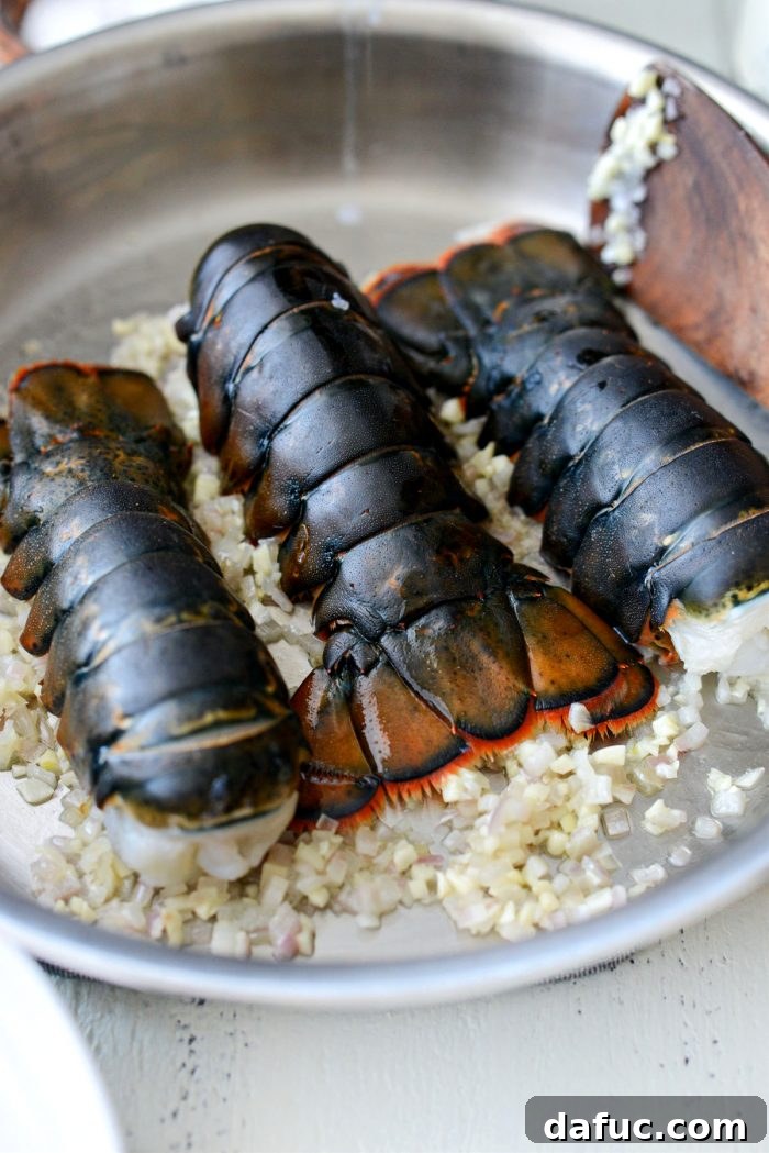 add lobsters to sauteed garlic and shallot.