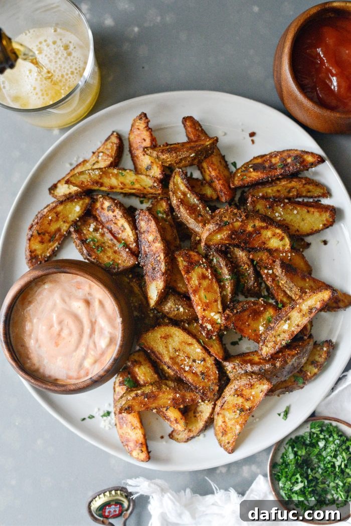 A Generous Portion of Crispy Potato Wedges on a Serving Platter