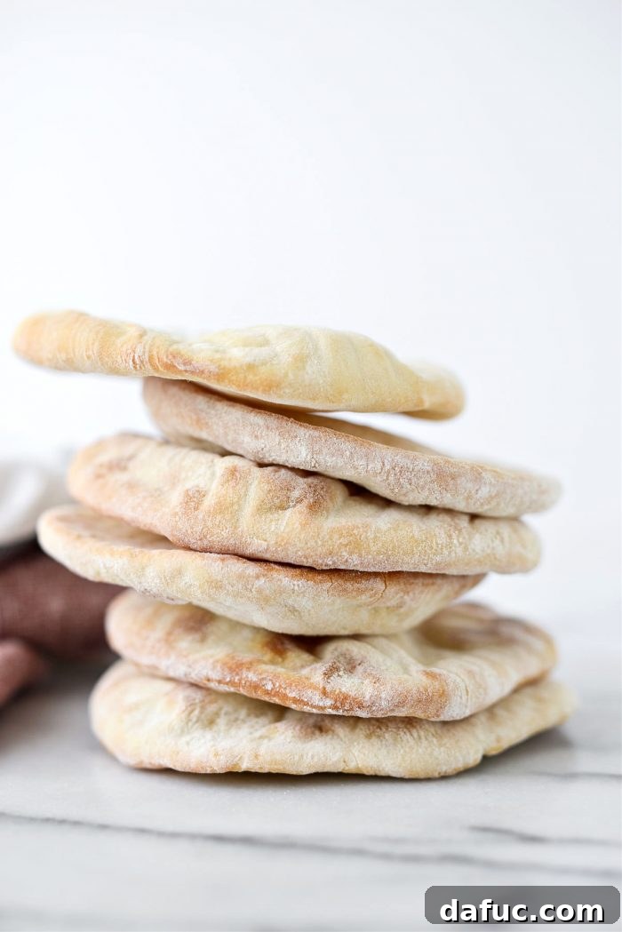 Bite-Sized Pita Pockets 2 Delicious Homemade Mini Pita Bread stacked on a plate