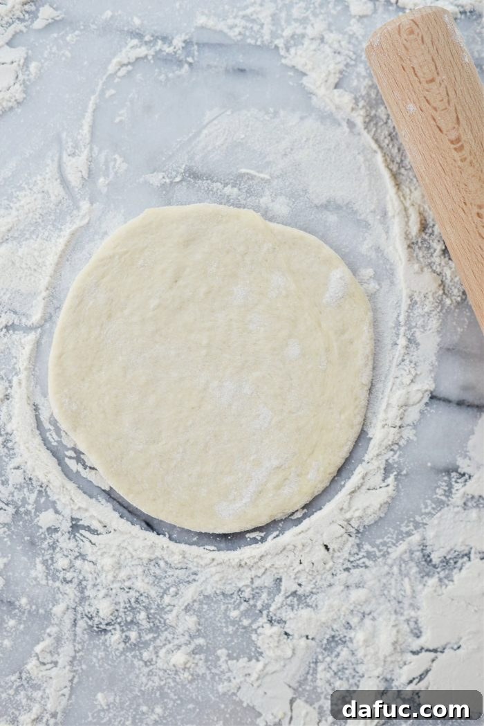 Bite-Sized Pita Pockets 18 Rolling out pita dough to an approximate 4 inches in diameter for mini pitas