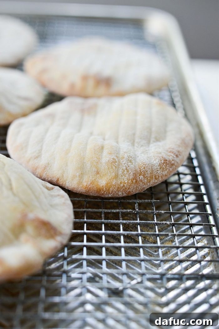 Bite-Sized Pita Pockets 20 Freshly baked mini pita bread, some perfectly puffed, just out of the oven