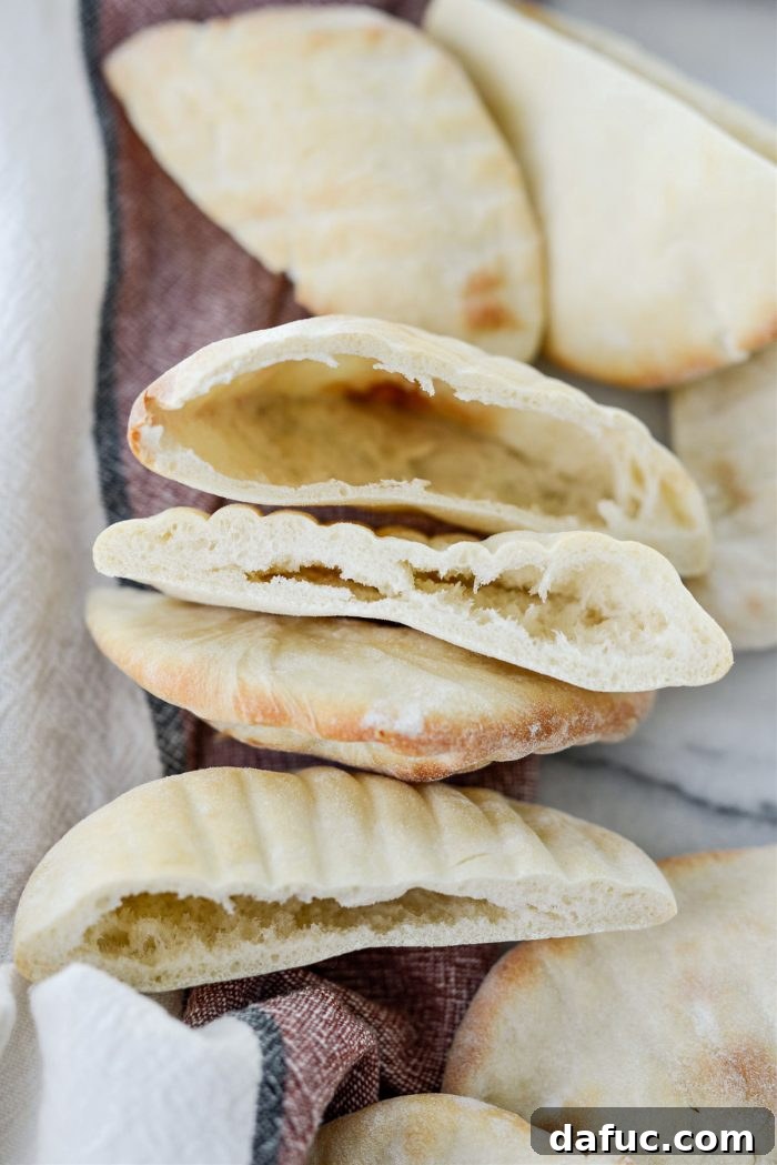 Bite-Sized Pita Pockets 24 Closeup of warm, fluffy homemade mini pita bread, showing its texture