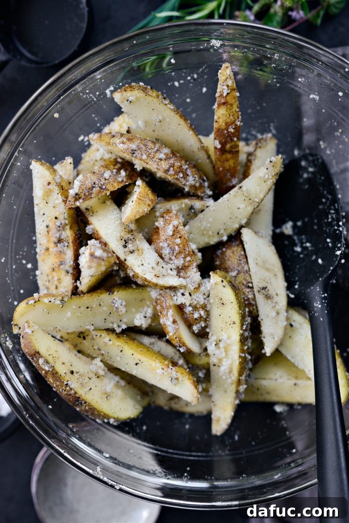 toss potatoes with seasoning