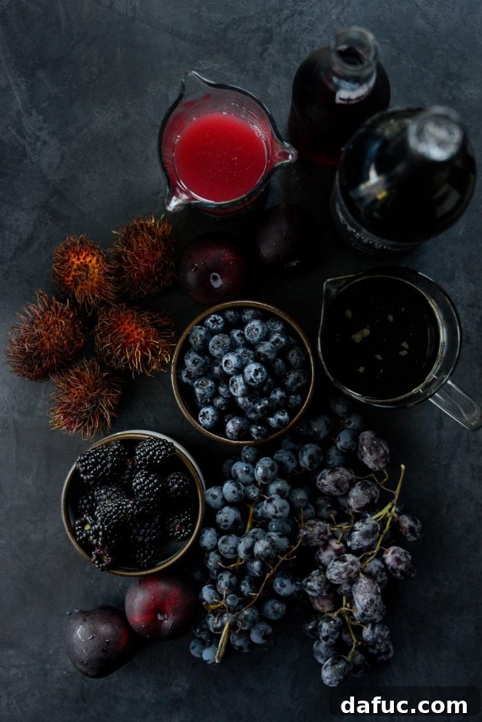 Ingredients for Black Magic Sangria laid out on a table