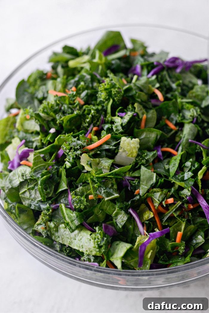 The fully combined My Go-To Kale Salad Blend, showcasing all ingredients tossed together.