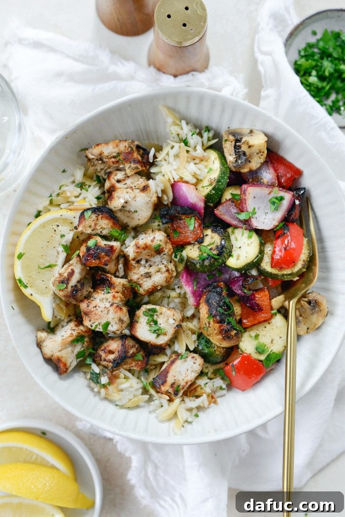 The Story of 2021 14 Platter of Chicken Souvlaki with Grilled Vegetables and lemon wedges