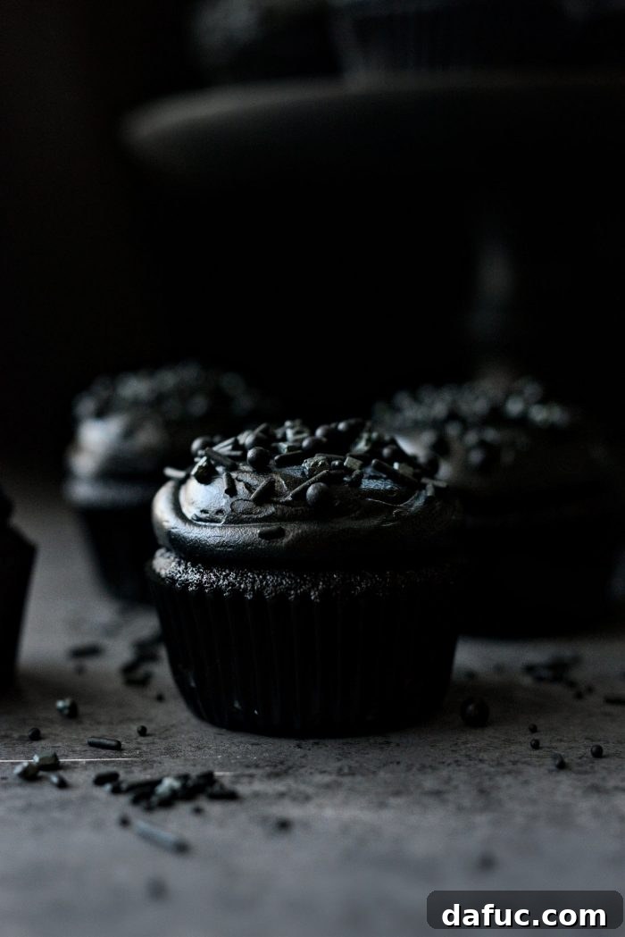 The Story of 2021 22 Elegant Black Velvet Cupcakes with rich black cream cheese frosting