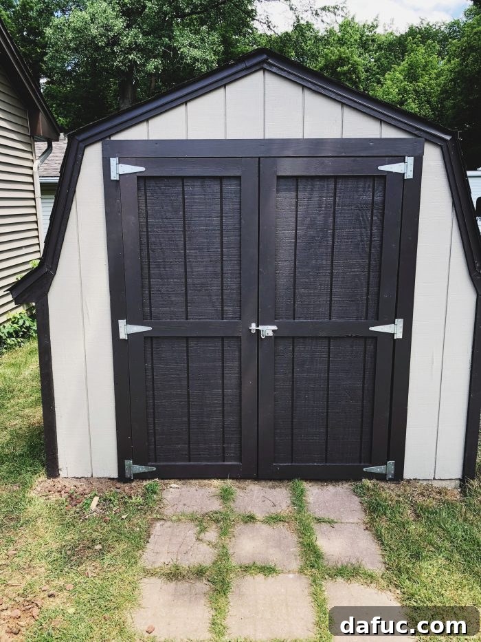 The Story of 2021 37 After photo of a newly renovated and painted backyard shed