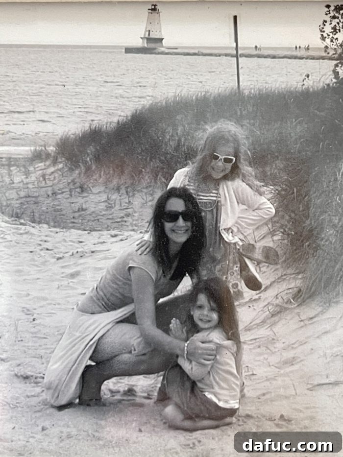 The Story of 2021 48 Then and now photo of the girls recreating a childhood memory by Lake Michigan
