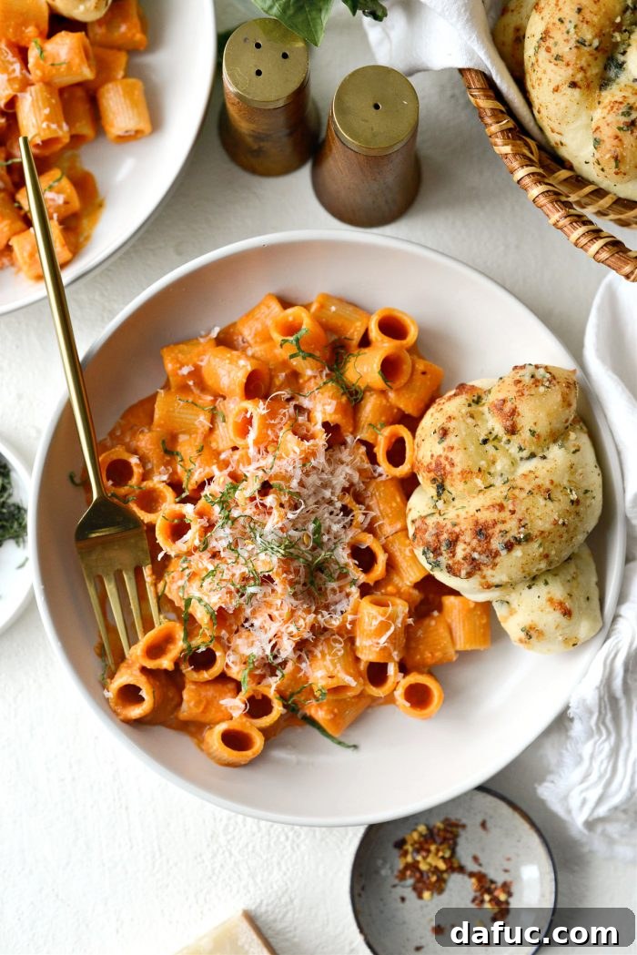 The Story of 2021 10 Close-up of creamy Spicy Garlic Pasta alla Vodka with fresh herbs